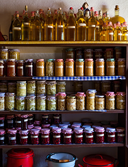 A stockpile shelf filled with bottles and jars