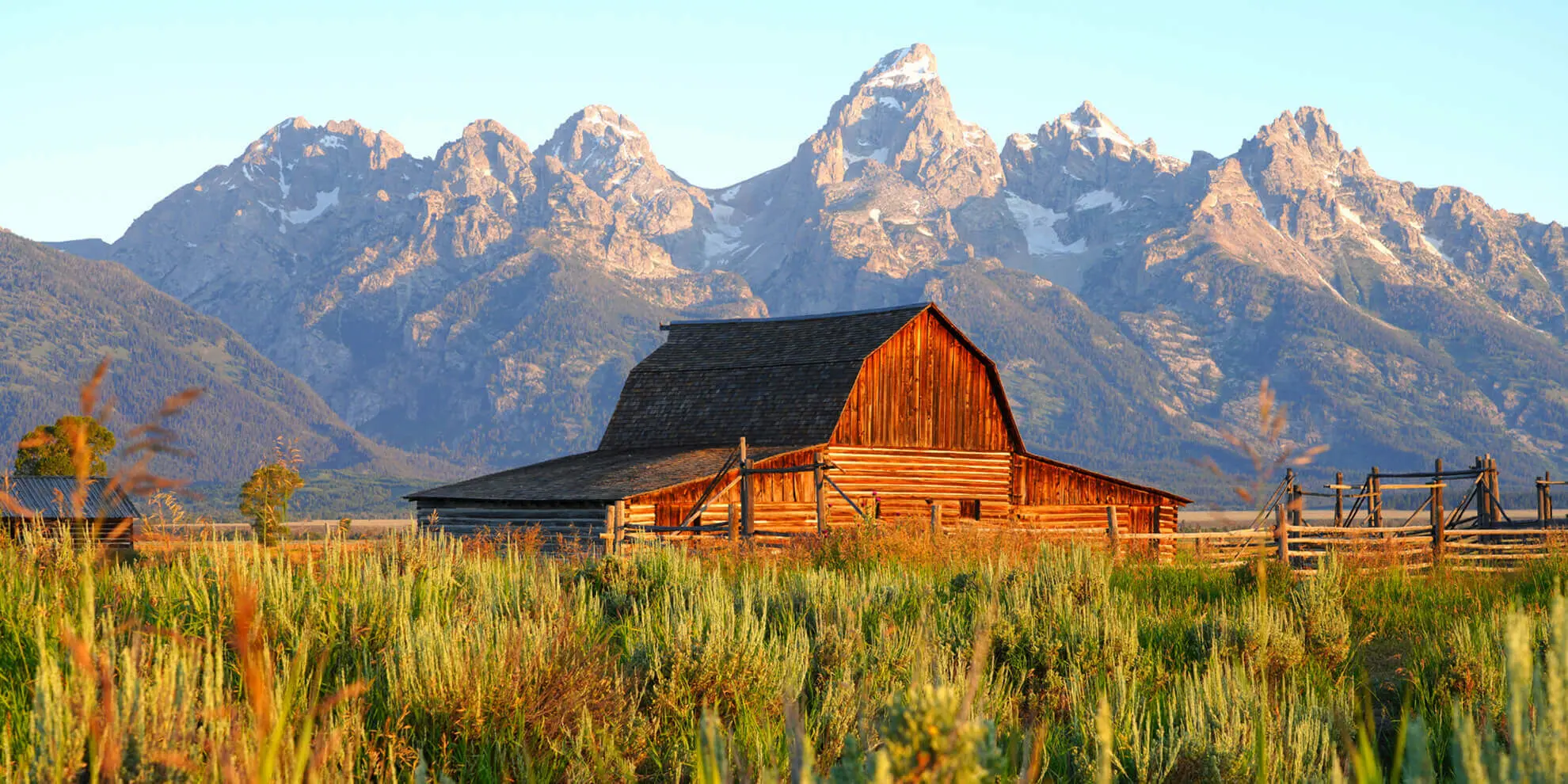 A wood barn in country side with mountain view